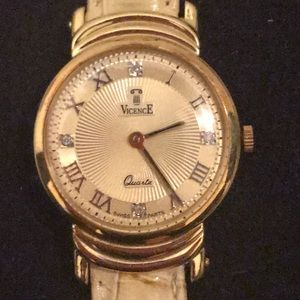 Authentic 14k gold Vicence leather wristwatch
